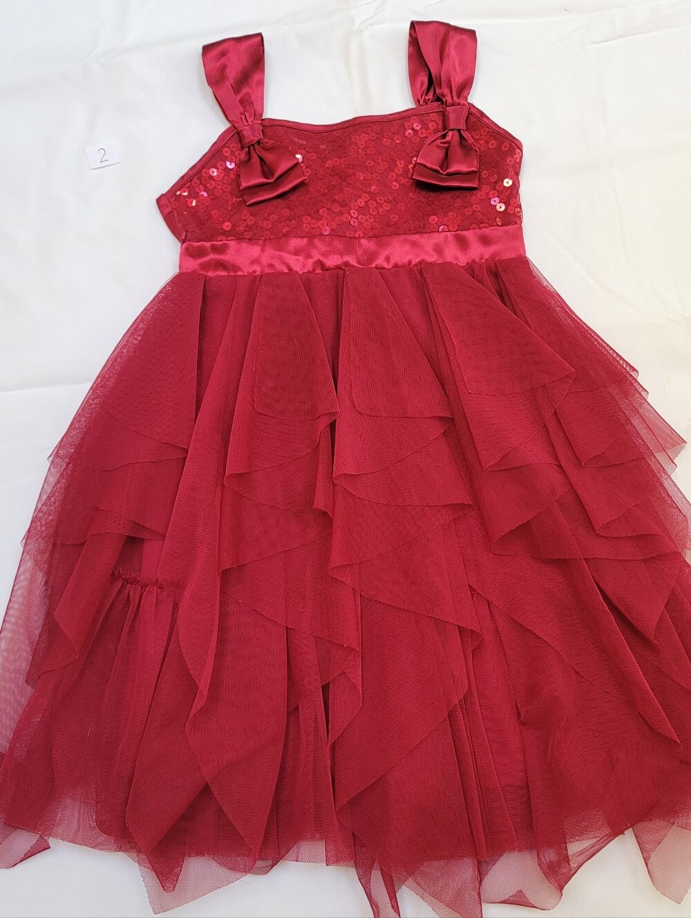 Burgandy Red Holiday Dress With Sequin And Satin Accent And A Tiered Tulle Skirk